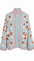 Baby Blue con Flores naranjas y beige